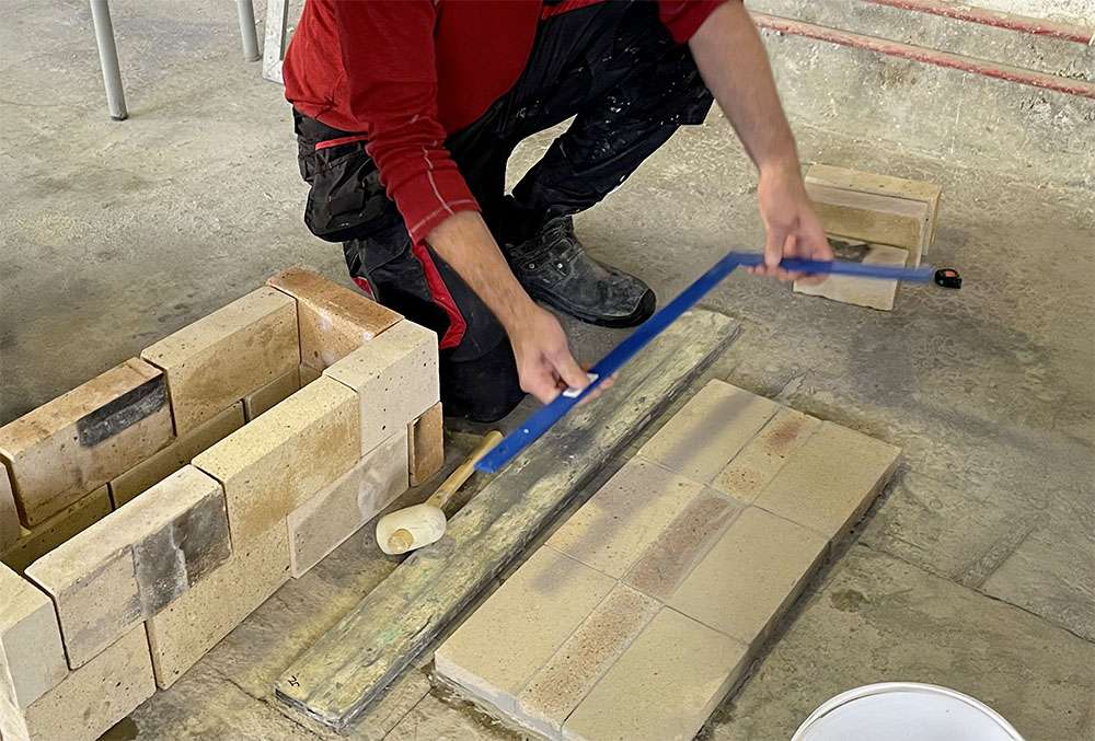 partenariat entre REVEX et l’AFPMA pour la première formation certifiante de poêlier–constructeur en France